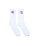 Zwei Paar weiße Tennissocken von COMME PAS DEUX auf hellem Hintergrund, elastisch und bequem für sportliche Aktivitäten.