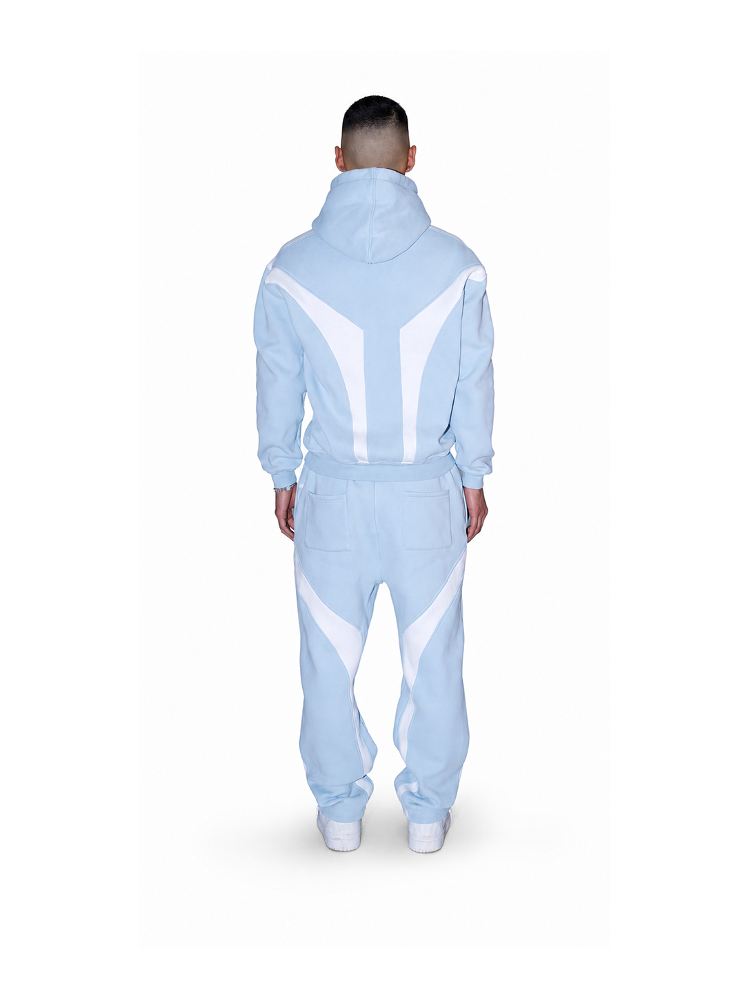 Baby Open Leg Jogger in Blau von COMME PAS DEUX, Rückansicht mit elastischem Bund und bequemer Passform