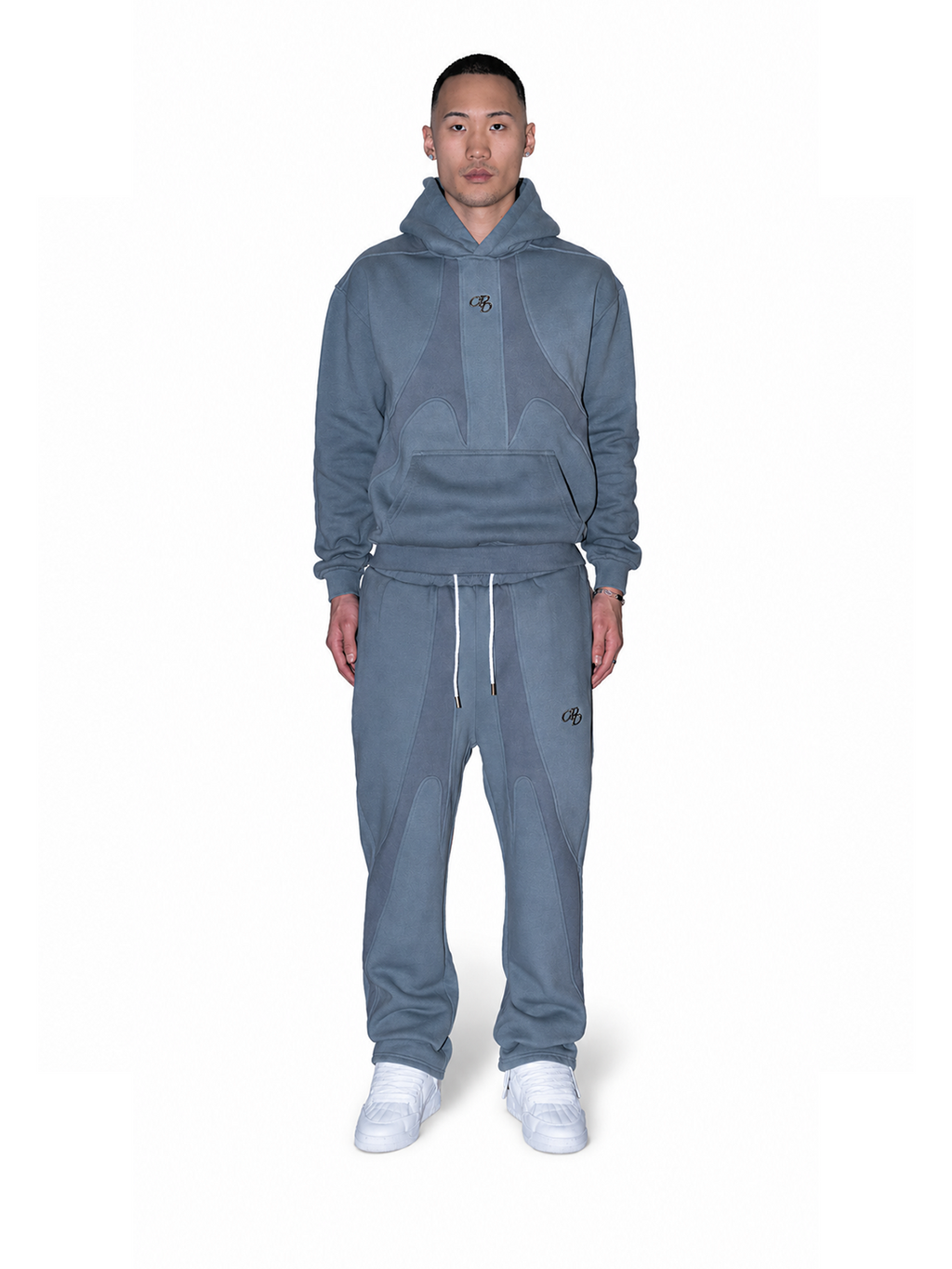 Graue OPEN LEG JOGGER von COMME PAS DE DEUX, vorne sichtbar, bequemer Hosenstil mit offenem Beinabschnitt.