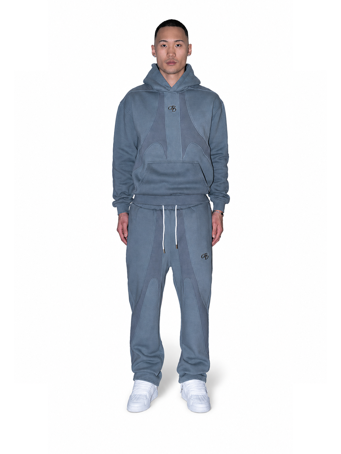 Graue OPEN LEG JOGGER von COMME PAS DE DEUX, vorne sichtbar, bequemer Hosenstil mit offenem Beinabschnitt.