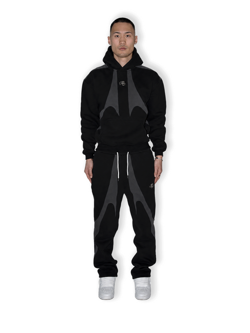 Schwarze Open Leg Jogger Hose von COMME PAS DEUX, vorne sichtbar, bequemer Schnitt und modischer Stil